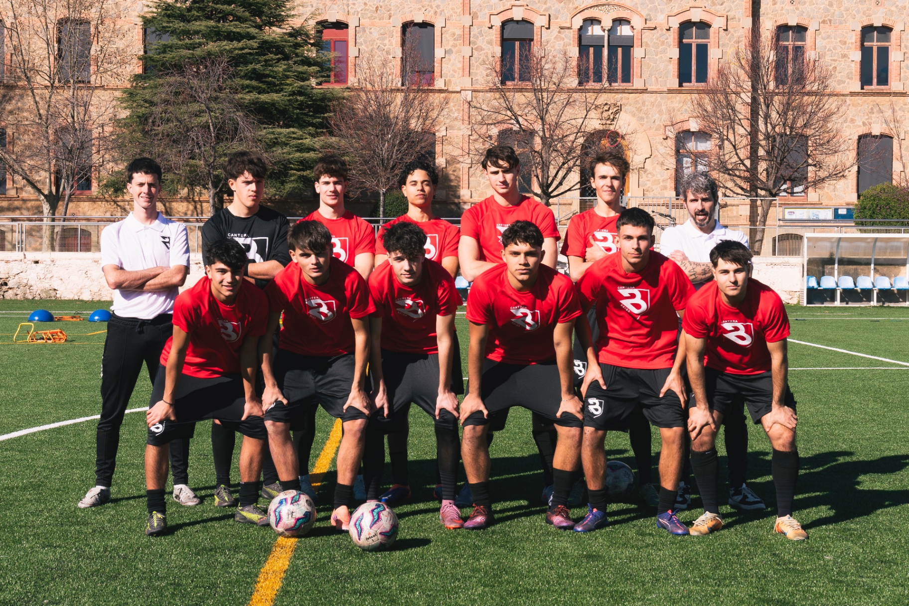 Double Sports players and coaches together on the pitch